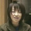 16023